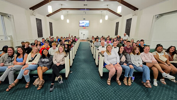 Large group of students in church sanctuary