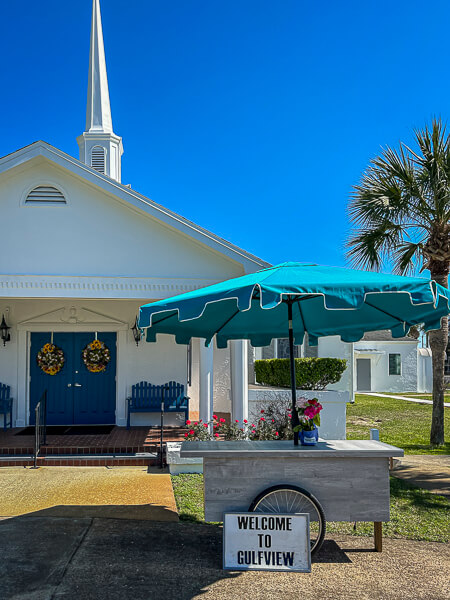 Welcome Wagon in front of church entrance