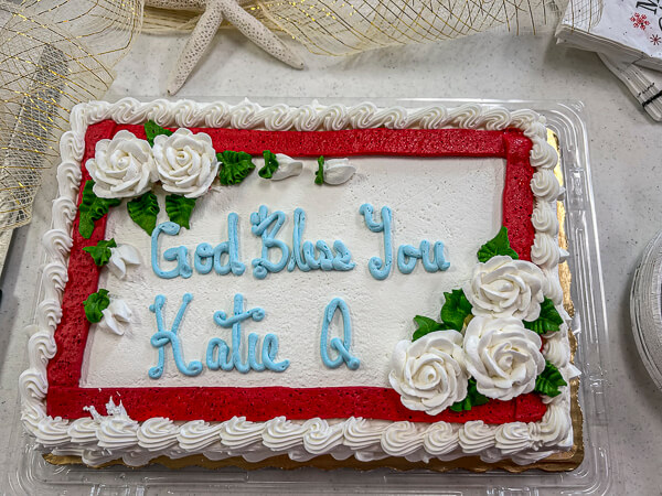 Cake that says God Bless You, Katie Q