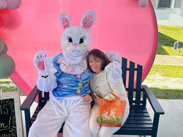 Easter Bunny hugs a woman at the Pancake Breakfast