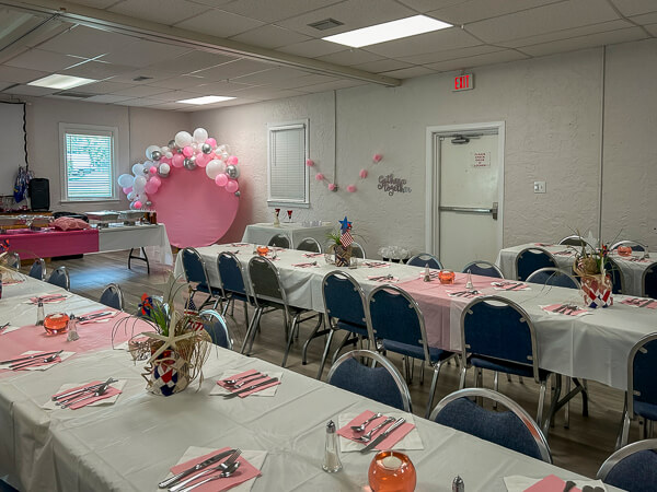 Fellowship Hall is brightly decorated for vow renewal reception dinner.
