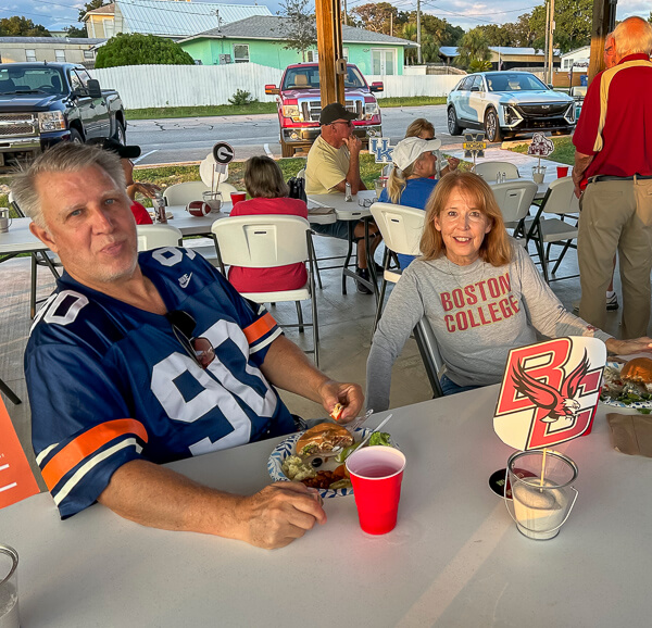 Boston College fans sit at table