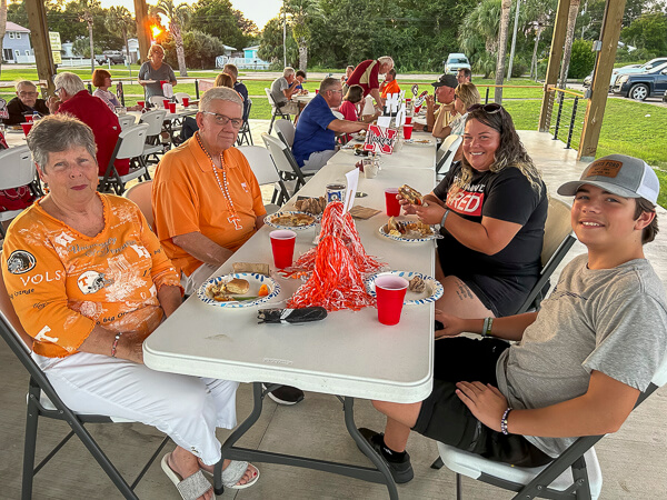 University of Tennessee fans sit at table