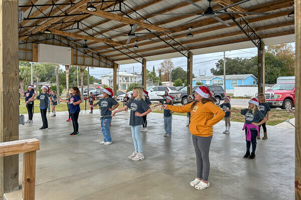 West Bay students perform in the pavilion.