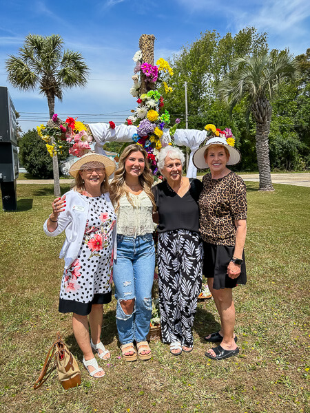 Four women look pretty outside of the church on Easter morning.