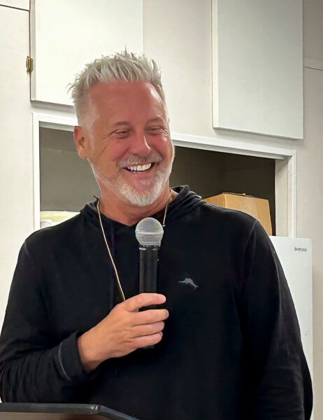 Man speaks at Emmaus Walk Dinner