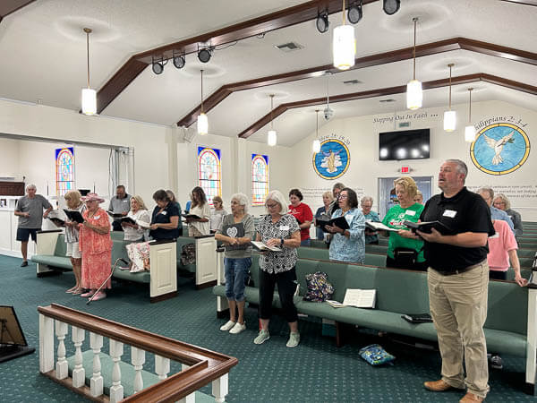 Women sing in the sanctuary