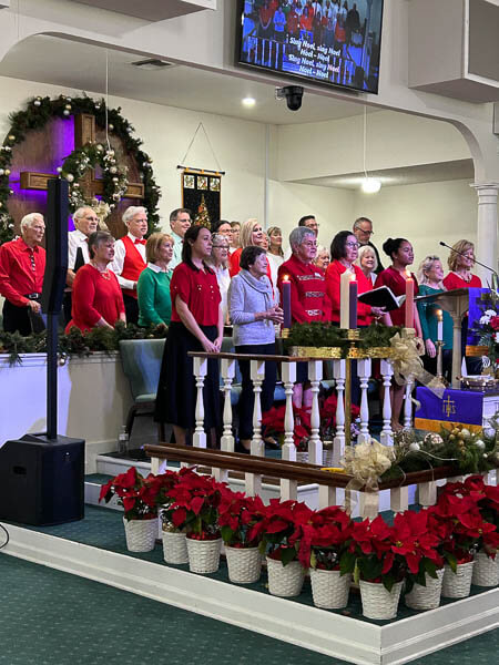 Choir sings during Advent worship service