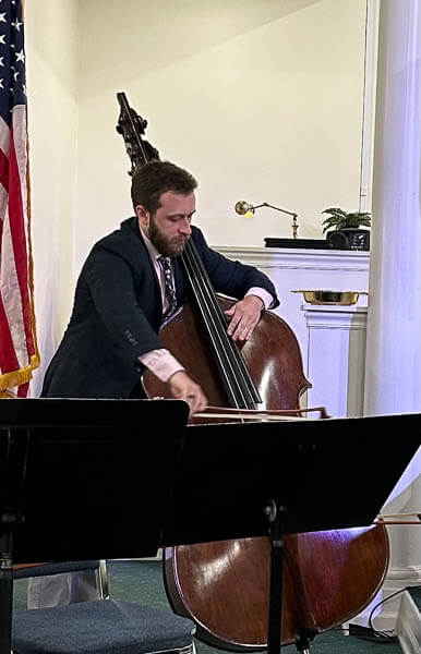 A man plays a musical instrument on Easter